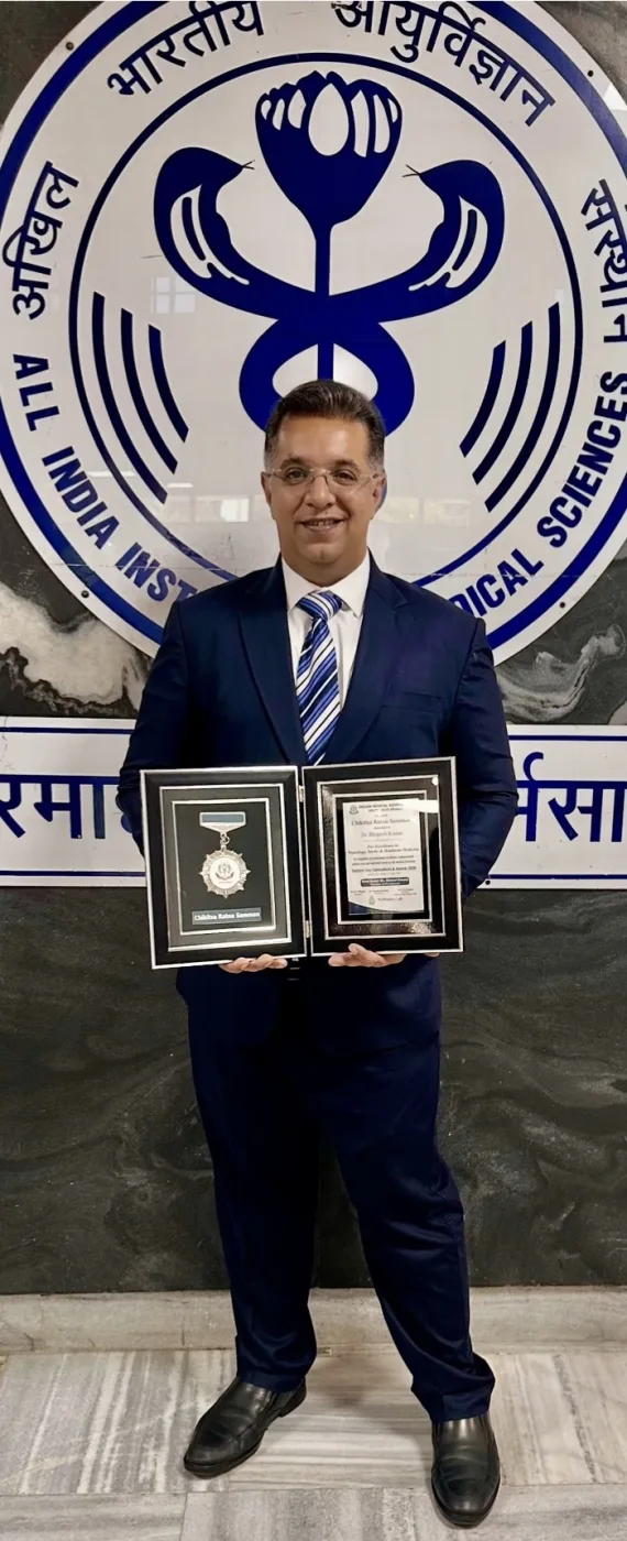 Dr. Bhupesh Kumar with the IMA Chikitsa Ratna Samman award at AIIMS New Delhi